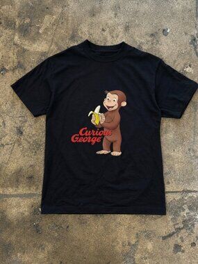Curious George Peeling a Banana Modern Cartoon with Logo Toddler T-shirt